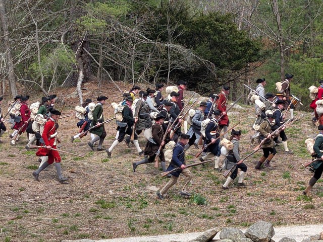 Militia soldiers running